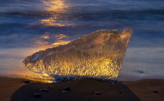 Sunlight making a chunk of ice glow
