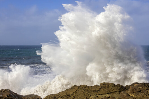 Water splasing against a rocky coast