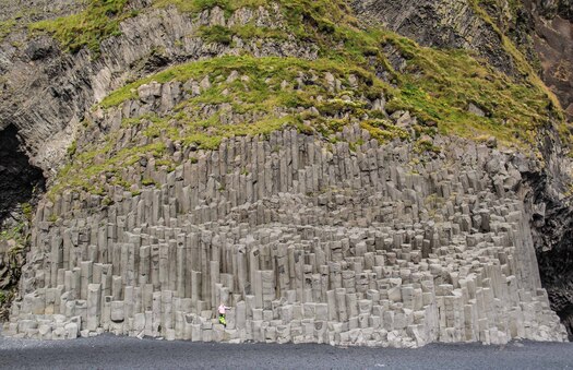 Large vertical rocks on a cliff face